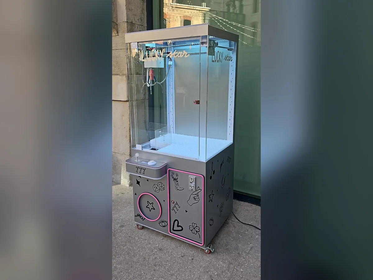 Machine à pince néon, photo 2